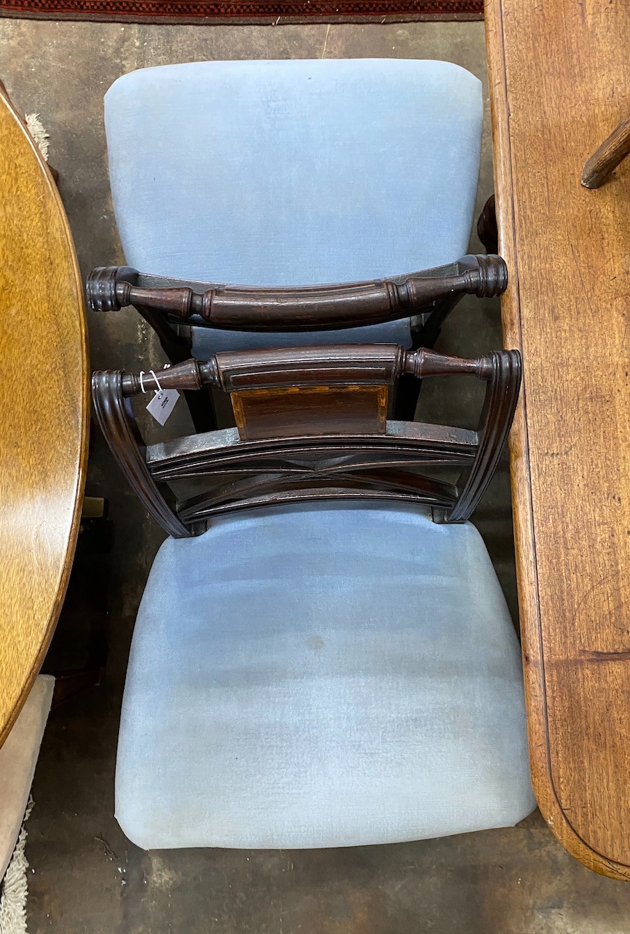 A pair of George III inlaid mahogany dining chairs